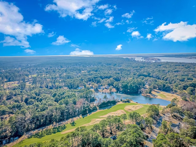 birds eye view of property with a water view, golf course view, and a wooded view