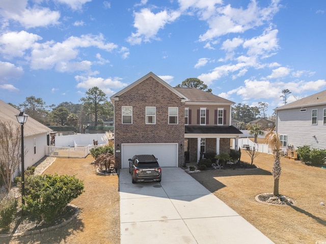 view of front of home featuring concrete driveway, brick siding, an attached garage, and fence