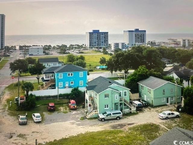 bird's eye view with a city view and a water view