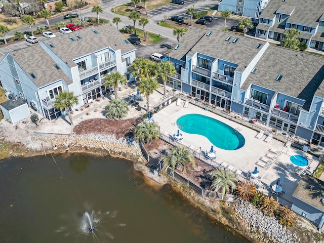 drone / aerial view with a water view