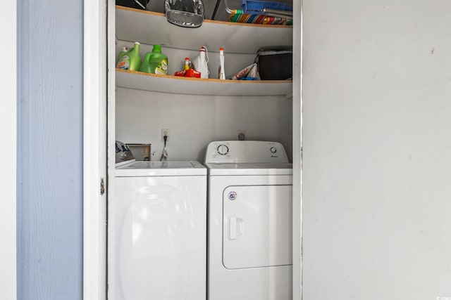 laundry area featuring laundry area and washing machine and clothes dryer