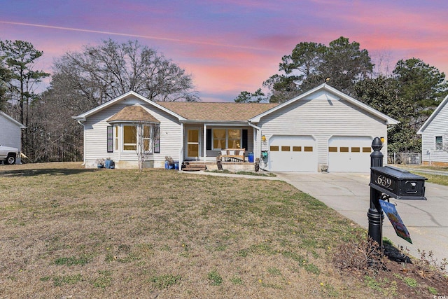 ranch-style home with an attached garage, a front lawn, a porch, and concrete driveway