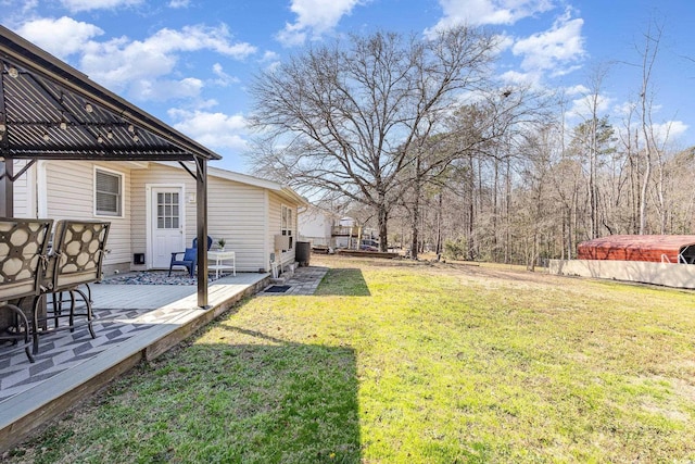 view of yard with a patio area