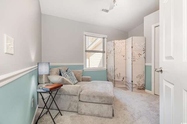 living area with carpet and visible vents