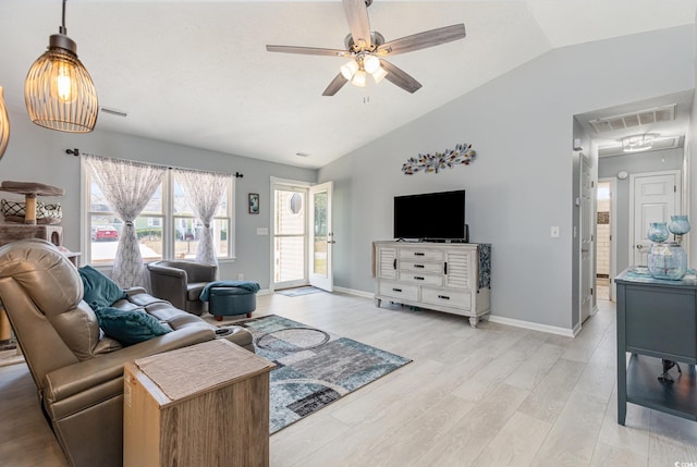 living area with lofted ceiling, ceiling fan, visible vents, and light wood-style floors