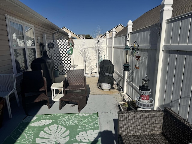 view of patio / terrace featuring a fenced backyard and grilling area