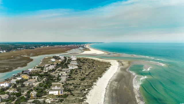 drone / aerial view with a water view and a beach view