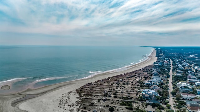 drone / aerial view with a view of the beach and a water view