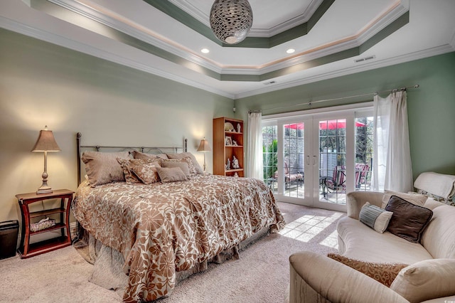 carpeted bedroom with access to exterior, french doors, visible vents, and a raised ceiling