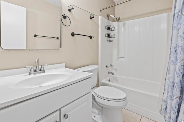 full bathroom featuring shower / bath combo with shower curtain, vanity, toilet, and tile patterned floors