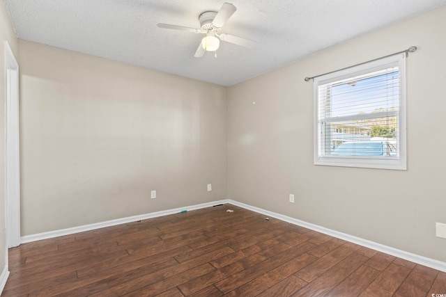 spare room featuring a ceiling fan, baseboards, a textured ceiling, and hardwood / wood-style floors