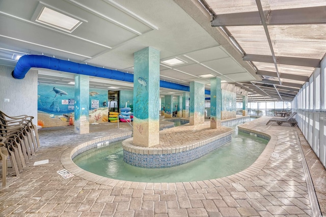 pool with a jacuzzi