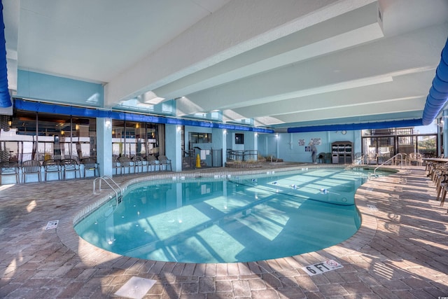 pool featuring a patio area