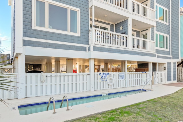 view of pool with fence