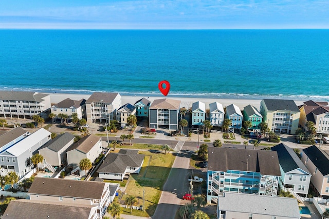 bird's eye view with a water view and a residential view