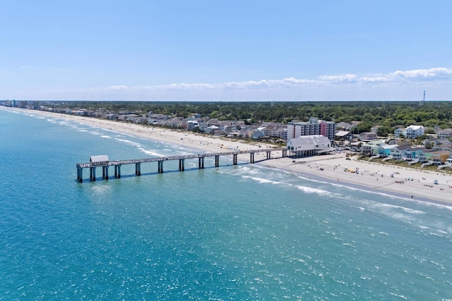 aerial view featuring a water view and a beach view