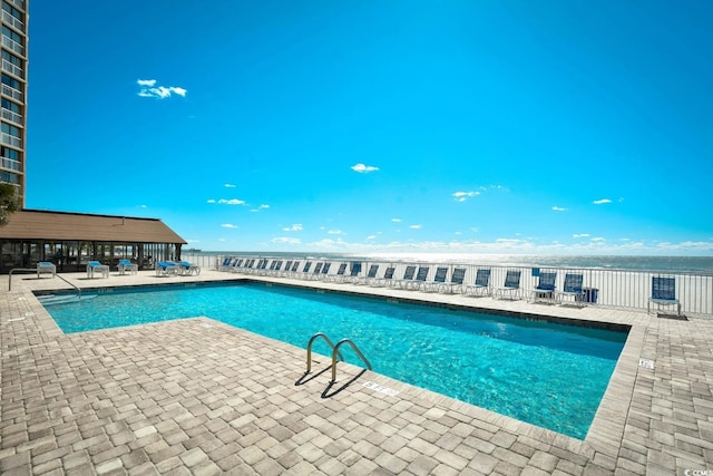 pool featuring a patio area