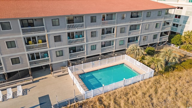 community pool with fence