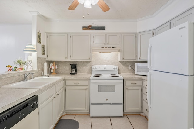 kitchen with light tile patterned floors, light countertops, a sink, white appliances, and under cabinet range hood