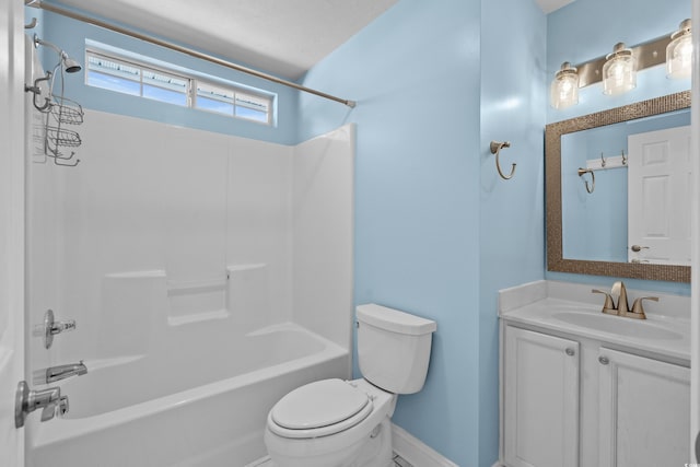 bathroom featuring shower / bathing tub combination, baseboards, toilet, and vanity