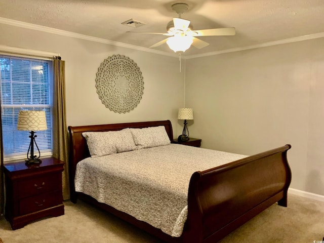 bedroom featuring light carpet, baseboards, visible vents, a ceiling fan, and ornamental molding