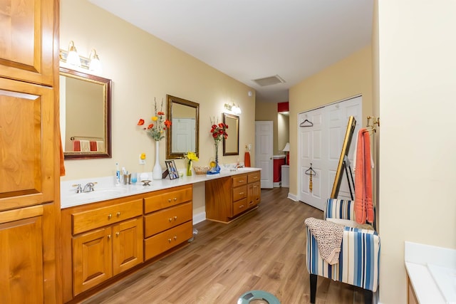 4244 Luck Ave, Little River, SC 29566 - full bathroom with double vanity and wood finished floors