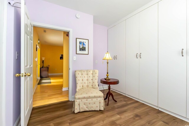 4244 Luck Ave, Little River, SC 29566 - sitting room featuring wood finished floors and baseboards