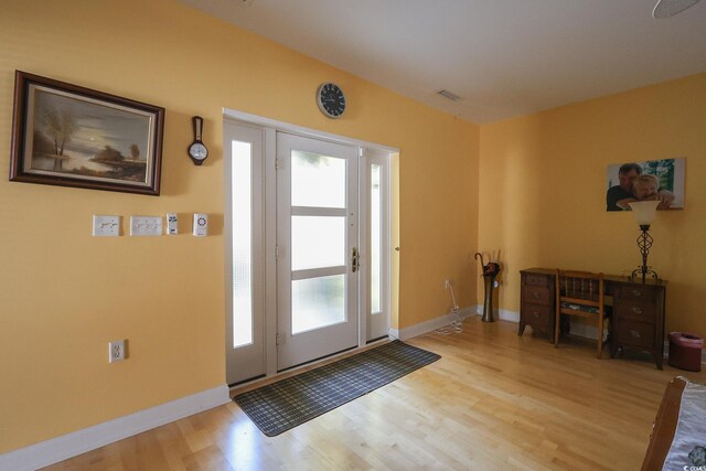 4244 Luck Ave, Little River, SC 29566 - entrance foyer featuring light wood-style floors and baseboards