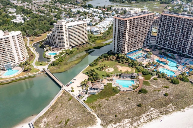 drone / aerial view with a water view and a view of city