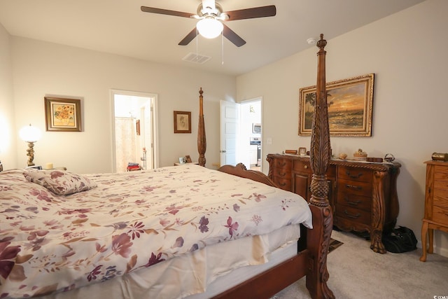 carpeted bedroom with visible vents and ceiling fan