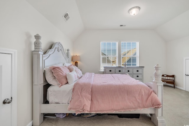 bedroom with lofted ceiling, light carpet, visible vents, and baseboards