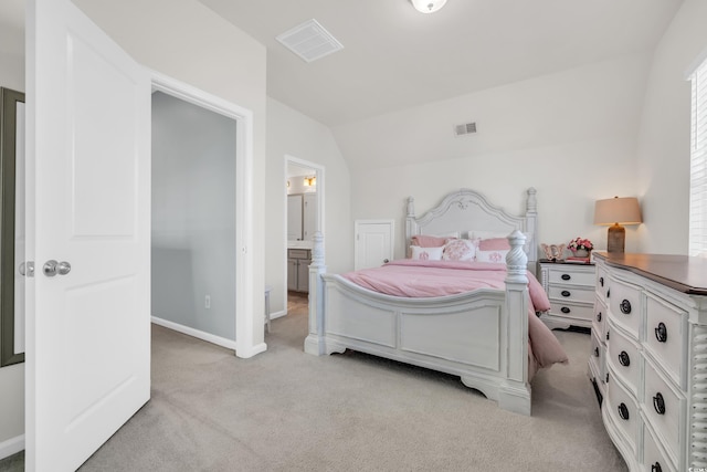 bedroom featuring baseboards, visible vents, vaulted ceiling, and light colored carpet