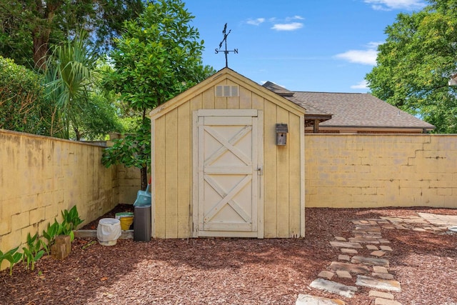 4306 Windy Heights Dr, North Myrtle Beach, SC 29582 - view of shed with a fenced backyard