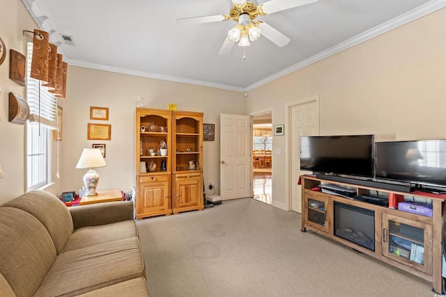 4306 Windy Heights Dr, North Myrtle Beach, SC 29582 - carpeted living area with crown molding, ceiling fan, and baseboards