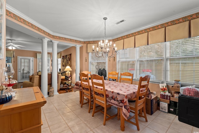 4306 Windy Heights Dr, North Myrtle Beach, SC 29582 - dining space with decorative columns, a ceiling fan, light tile patterned floors, a chandelier, and plenty of natural light