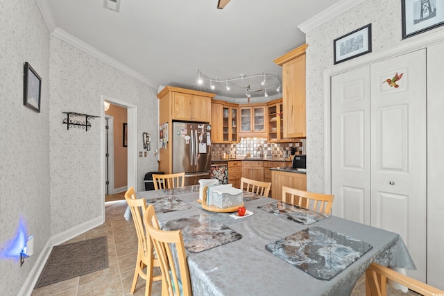4306 Windy Heights Dr, North Myrtle Beach, SC 29582 - dining area featuring ornamental molding, light tile patterned flooring, wallpapered walls, and baseboards