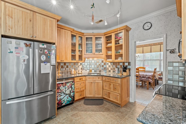 4306 Windy Heights Dr, North Myrtle Beach, SC 29582 - kitchen featuring freestanding refrigerator, a sink, ornamental molding, tasteful backsplash, and glass insert cabinets