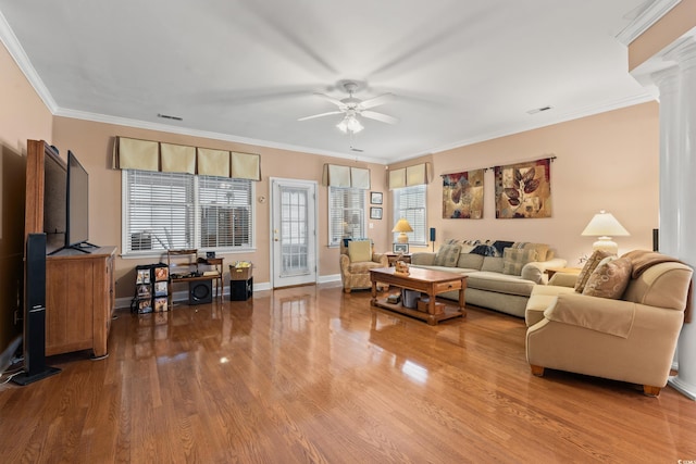 4306 Windy Heights Dr, North Myrtle Beach, SC 29582 - living area with decorative columns, ceiling fan, wood finished floors, crown molding, and baseboards