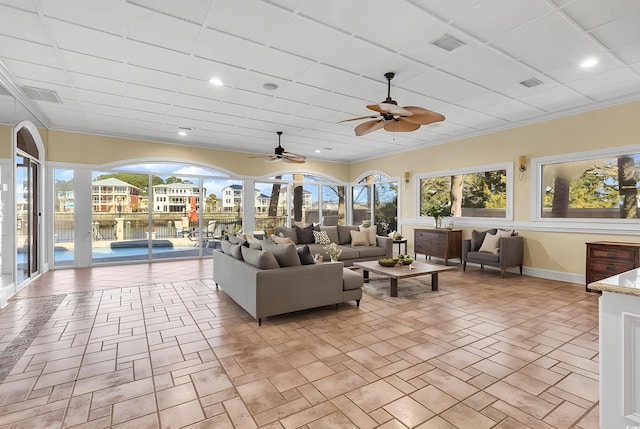 living area featuring plenty of natural light and visible vents