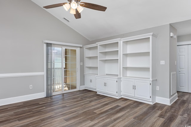 unfurnished living room with lofted ceiling, dark wood-style flooring, visible vents, and baseboards