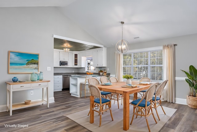 dining room with dark wood-style flooring, a notable chandelier, visible vents, high vaulted ceiling, and baseboards