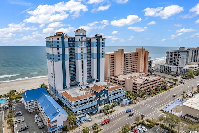 drone / aerial view with a view of city and a water view