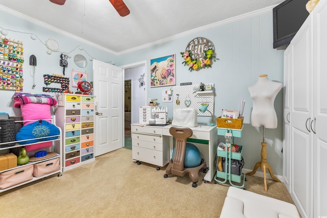 game room with carpet flooring, crown molding, a textured ceiling, and ceiling fan