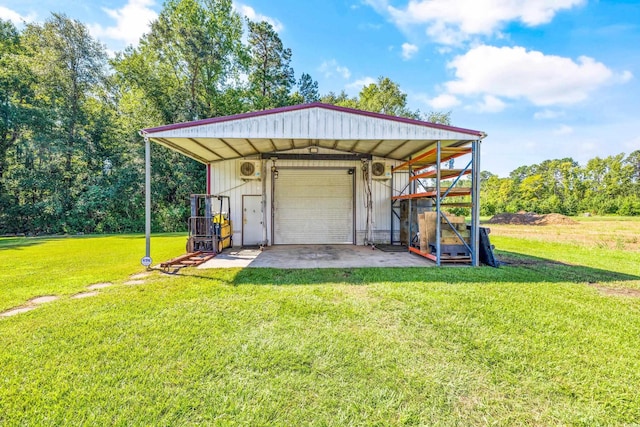 exterior space with an outbuilding and driveway