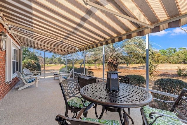 view of patio featuring outdoor dining space