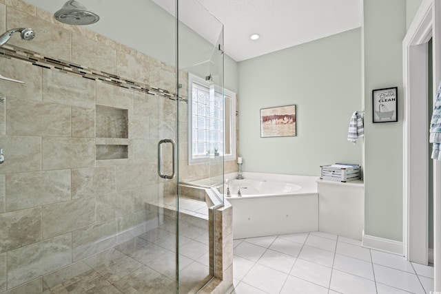 full bath with a stall shower, a bath, and tile patterned floors