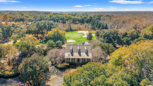 drone / aerial view with a view of trees