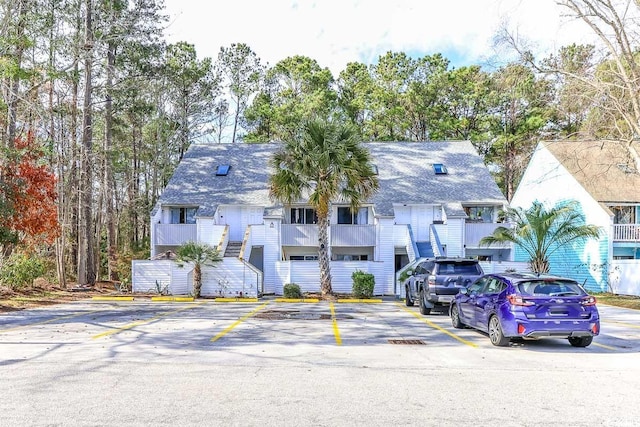 view of front of property with uncovered parking