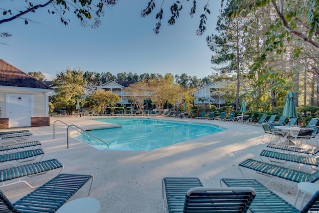 pool with a patio