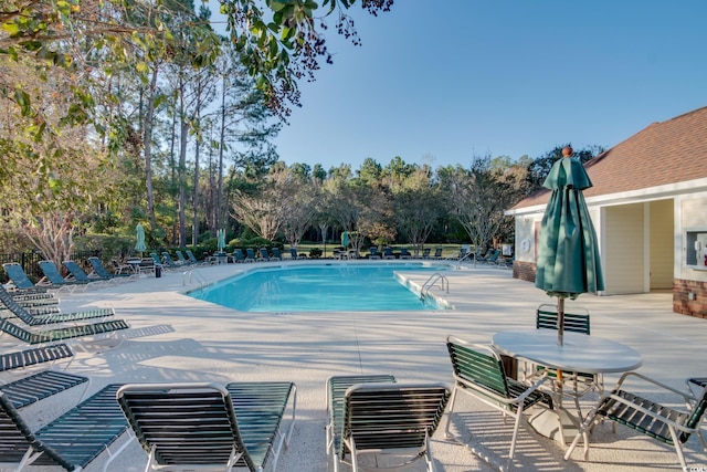 community pool featuring a patio